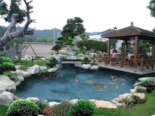 东海庭院鱼池假山设计
